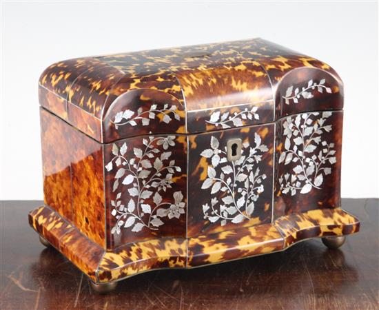 A Regency tortoiseshell and mother of pearl inlaid two division tea caddy, 7.75in.